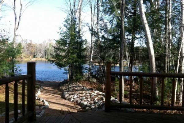 [Image: Rustic Wooded Lake Seclusion in a Cozy Log Cabin]