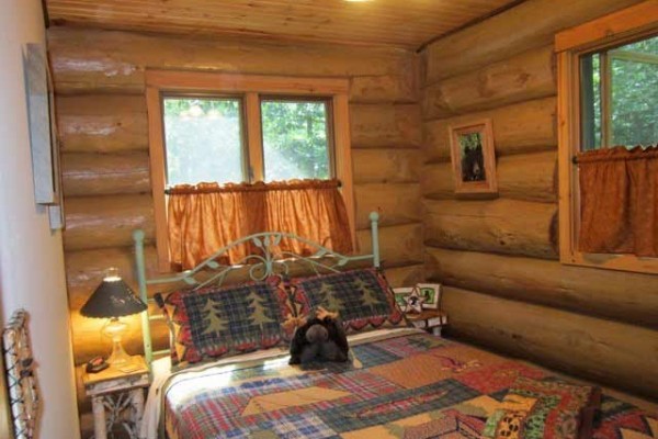 [Image: Rustic Wooded Lake Seclusion in a Cozy Log Cabin]