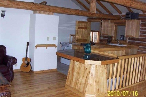 [Image: Spacious Water Front, Log Chalet; Lofted Ceilings, Fireplace]