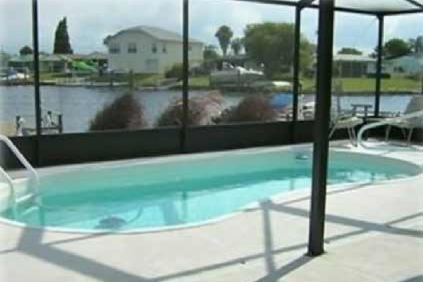 [Image: Waterfront, Heated Pool, Private Beach, Free Boat &amp; Internet]