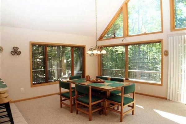 [Image: Two Stories of Comfort-15 Acres of Privacy. No Wonder the Eagle Landed Here!]