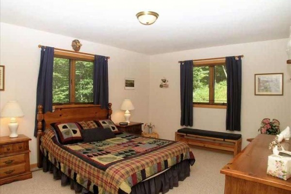 [Image: Two Stories of Comfort-15 Acres of Privacy. No Wonder the Eagle Landed Here!]