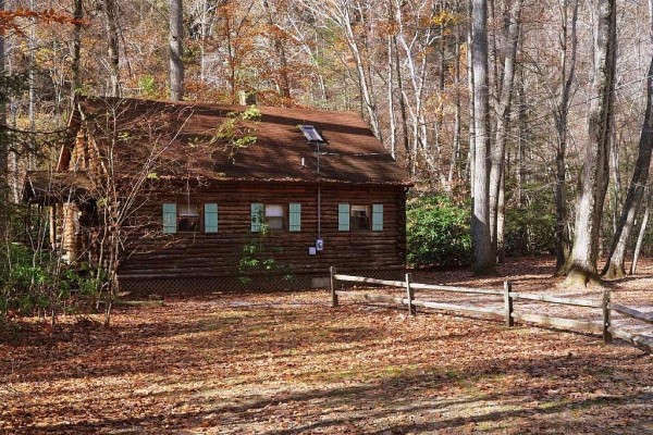 [Image: Private Riverfront Log Cabin Nestled in 7 Wooded Acres]