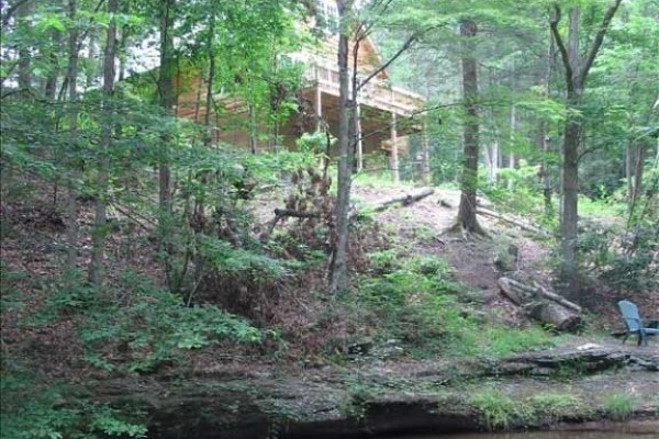 [Image: A Creek Runs Through This Private, Wooded Property!]
