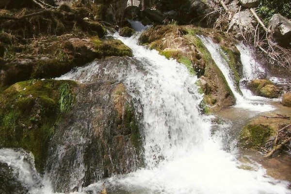 [Image: Mountain View, Cascading Waterfalls, Luxurious Getaway]