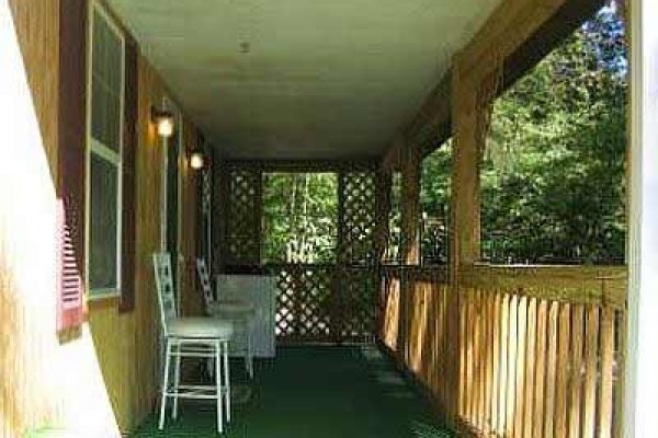 [Image: Retreat Cottage on Whitewater Stream]