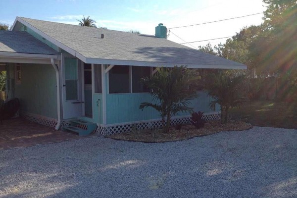 [Image: The Surf Cottage. Walk to Beach, Shops, Dining &amp; Water Sports]