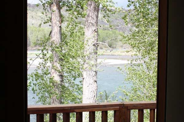 [Image: Beautiful Fishermans Cabins Overlooking the River. Shared Deck, Open Plan Living and Full Bathroom]