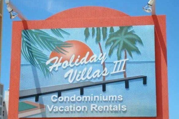 [Image: Holiday Villas III- Oceanfront? You Bet!]