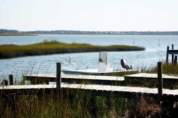 [Image: Dock in Front of the Cottage is a Perfect Place for Your Boat.]