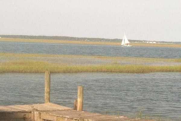 [Image: Dock in Front of the Cottage is a Perfect Place for Your Boat.]