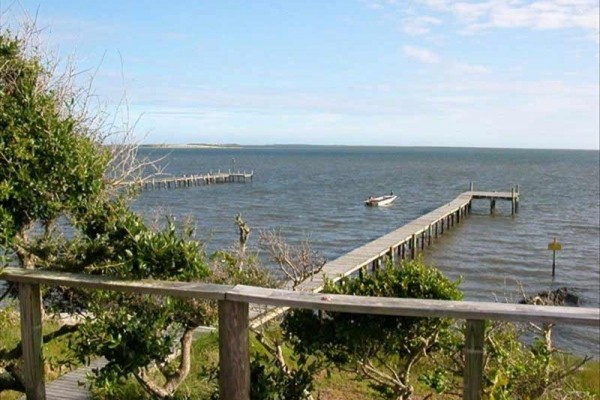 [Image: Rustic Cottage with Dock Overlooking Cape Lookout]