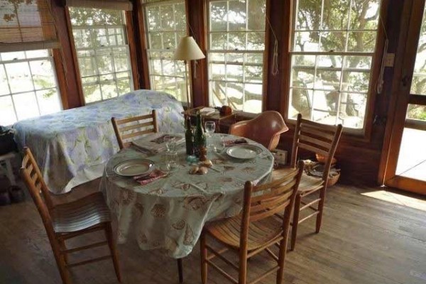 [Image: Rustic Cottage with Dock Overlooking Cape Lookout]