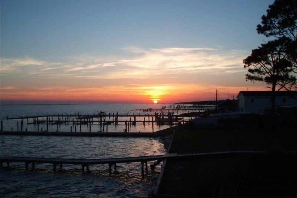 [Image: Rustic Cottage with Dock Overlooking Cape Lookout]