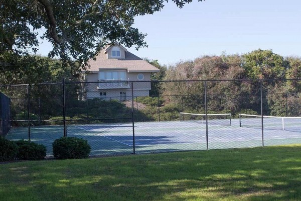 [Image: 4BR Oceanfront Condo with Private Beach Access and Swimming Pools!]