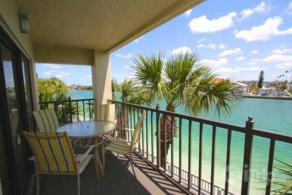 [Image: Corner Unit with Waterfront View. Updated, Private and Relaxing.]