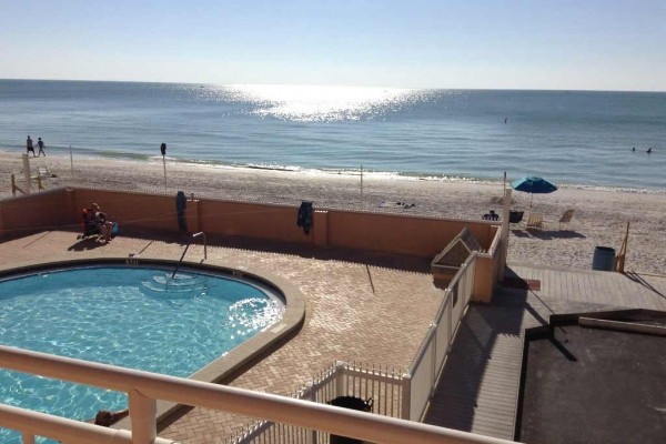 [Image: Oceanfront Condo on Private Sunset Beach. New Listing!]