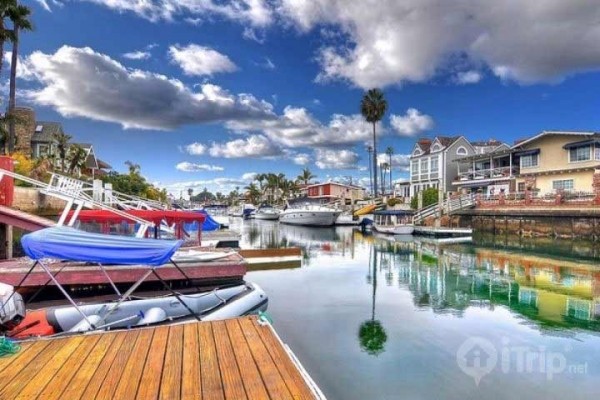 [Image: 3BR / 3BA Beach House with Private Dock and Spacious Patio]
