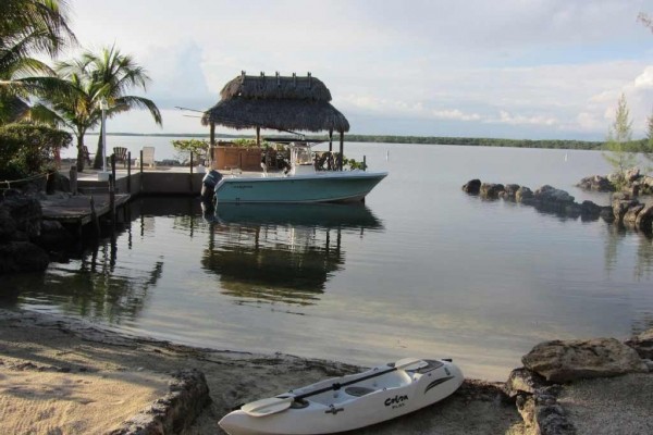 [Image: Beach on the Bay - Jacuzzi - Kayak-Bicycles-Boat Rental-Boat Dock-Sunset-Row Boa]