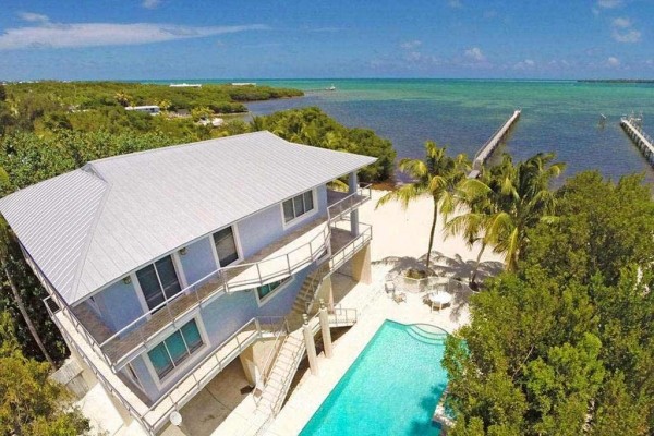 [Image: Oceanfront Estate with Boat Dockage]
