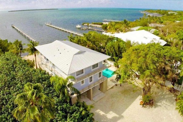 [Image: Oceanfront Estate with Boat Dockage]